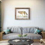 A red wolf artwork hanging above a sofa