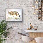 A piece of red wolf artwork hanging in a bar
